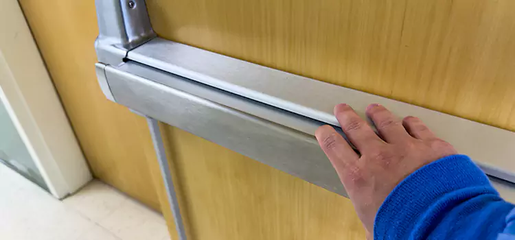 Installing a Push Bar on a Door Daphne